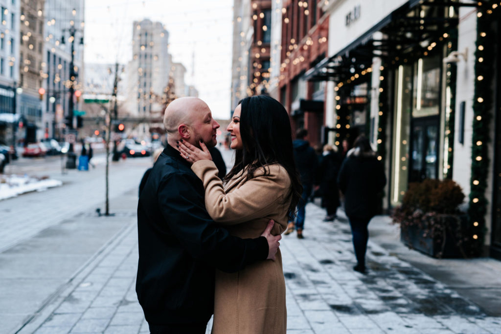 man and woman embracing on woodward ave.