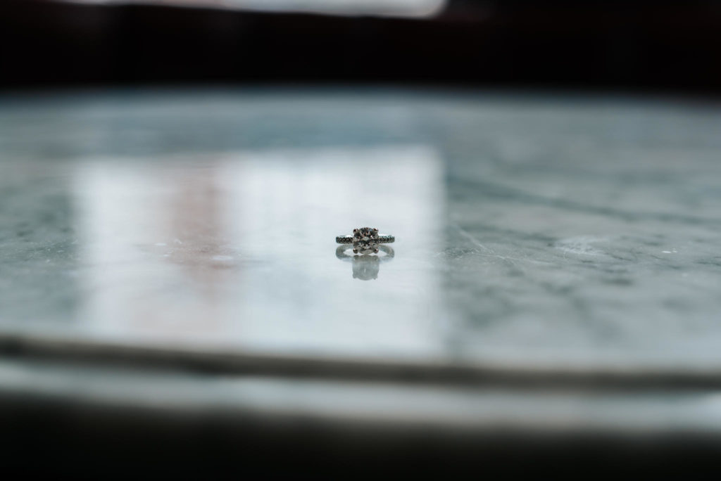 Engagement Ring on marble table.