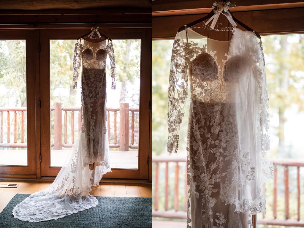 Wedding gown hanging in the window.