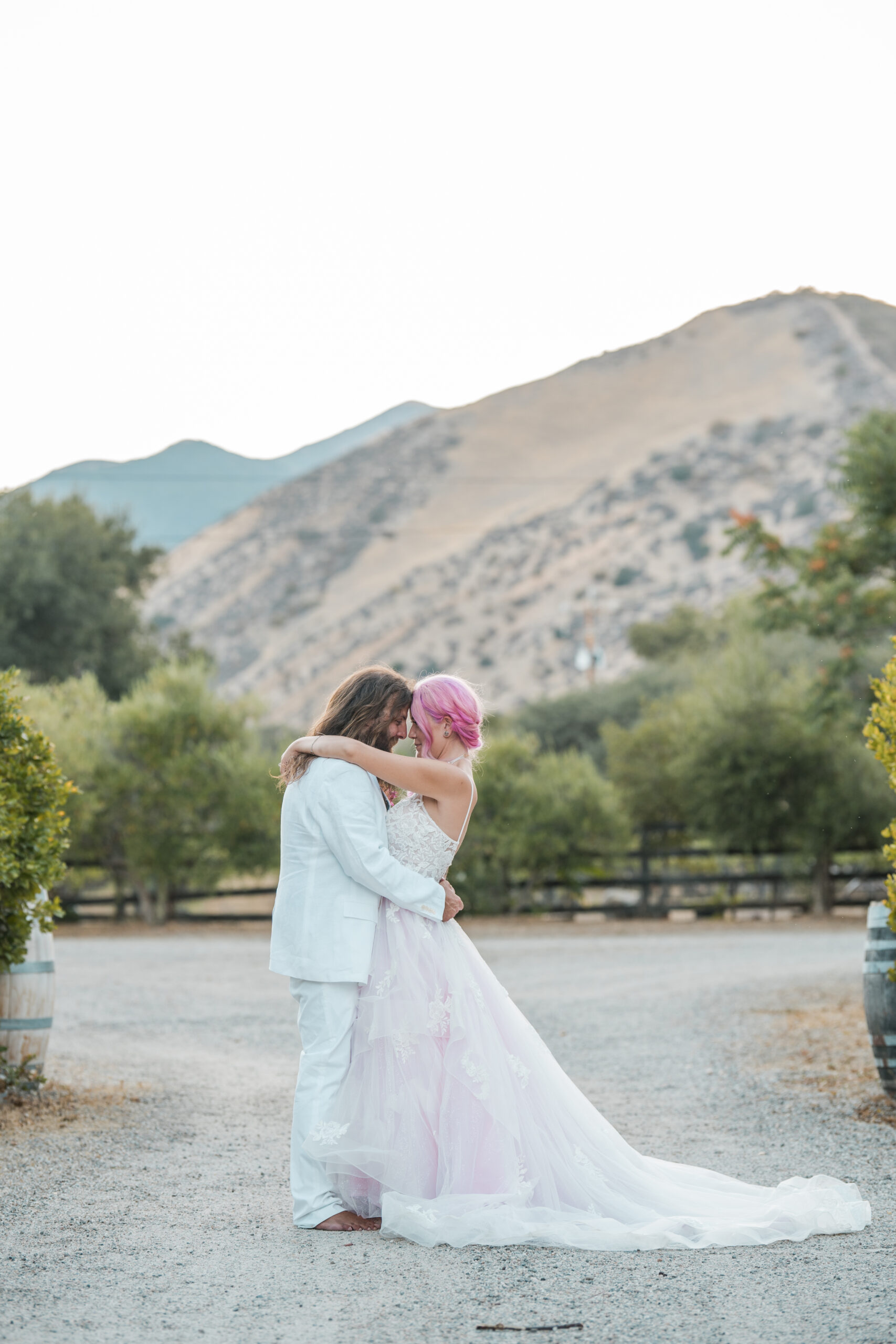 Couple posing at their california winery wedding